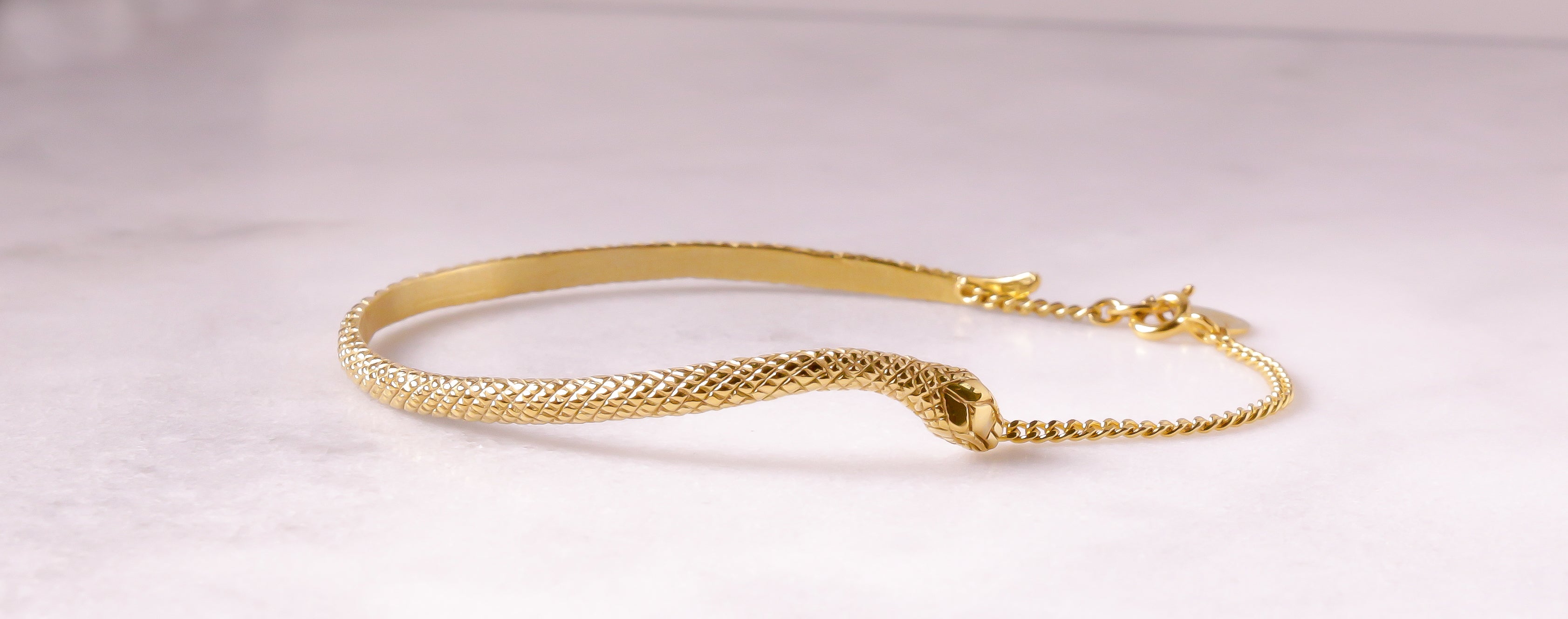 snake half bangle in gold by Louise Wade London