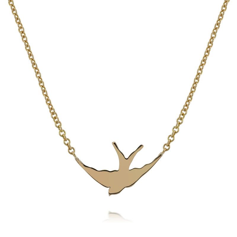 solid gold swallow silhouette necklace on gold chain by louise wade london