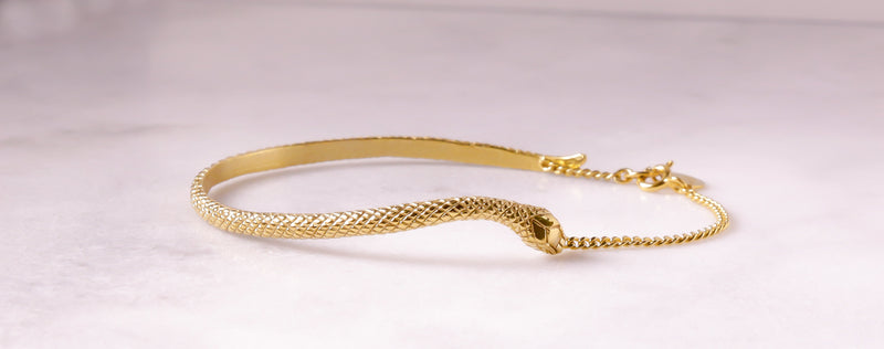 snake half bangle in gold by Louise Wade London