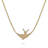 solid gold swallow silhouette necklace on gold chain by louise wade london